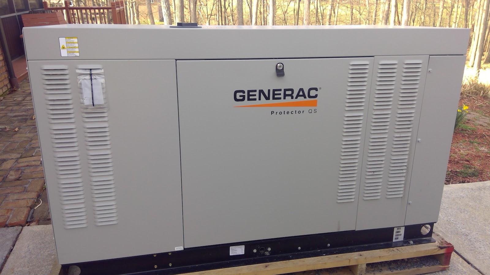 Liquid-cooled Generac standby generator on its pallet